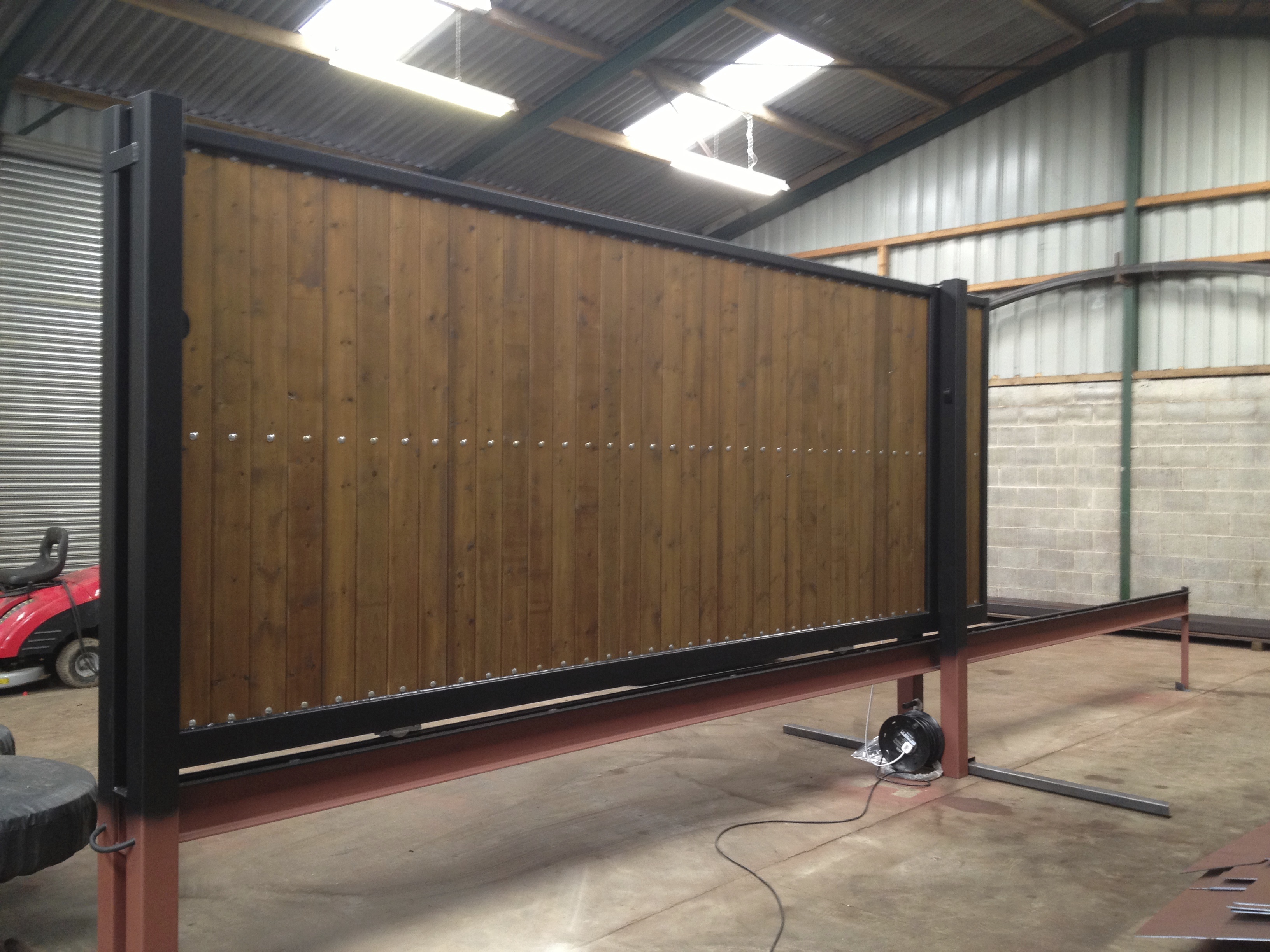 Steel Frame sliding gate with  tongue and groove infill, Pre automated prior to deliver to site